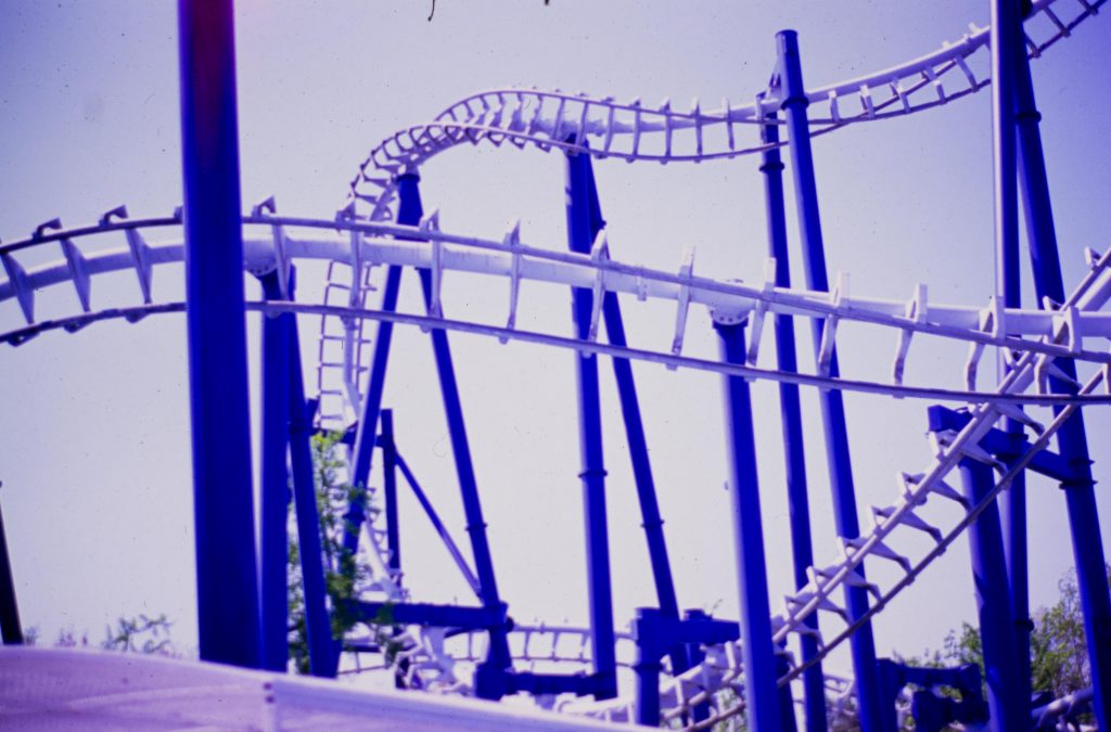 blue Roller coaster rails interwining in the air